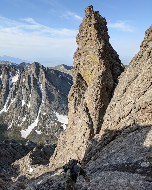 Brian hiking a high alpine ridge