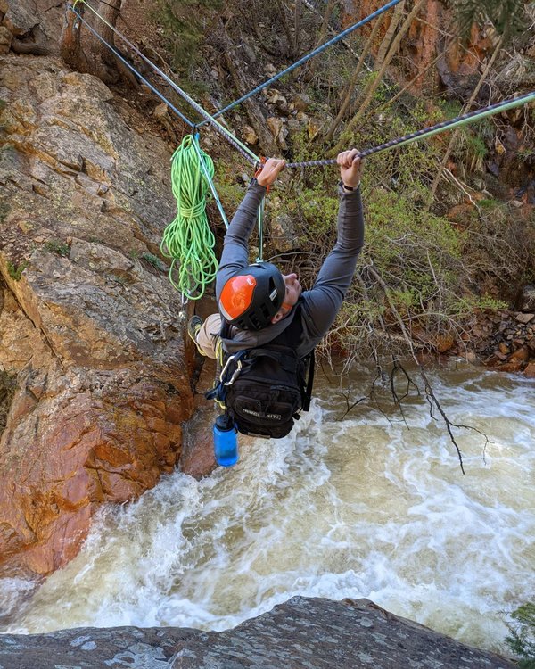 Brian on a Tyrolean traverse rope crossing